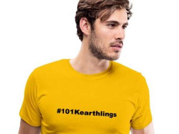 Model wearing yellow shirt with 101 Kearthlings logo